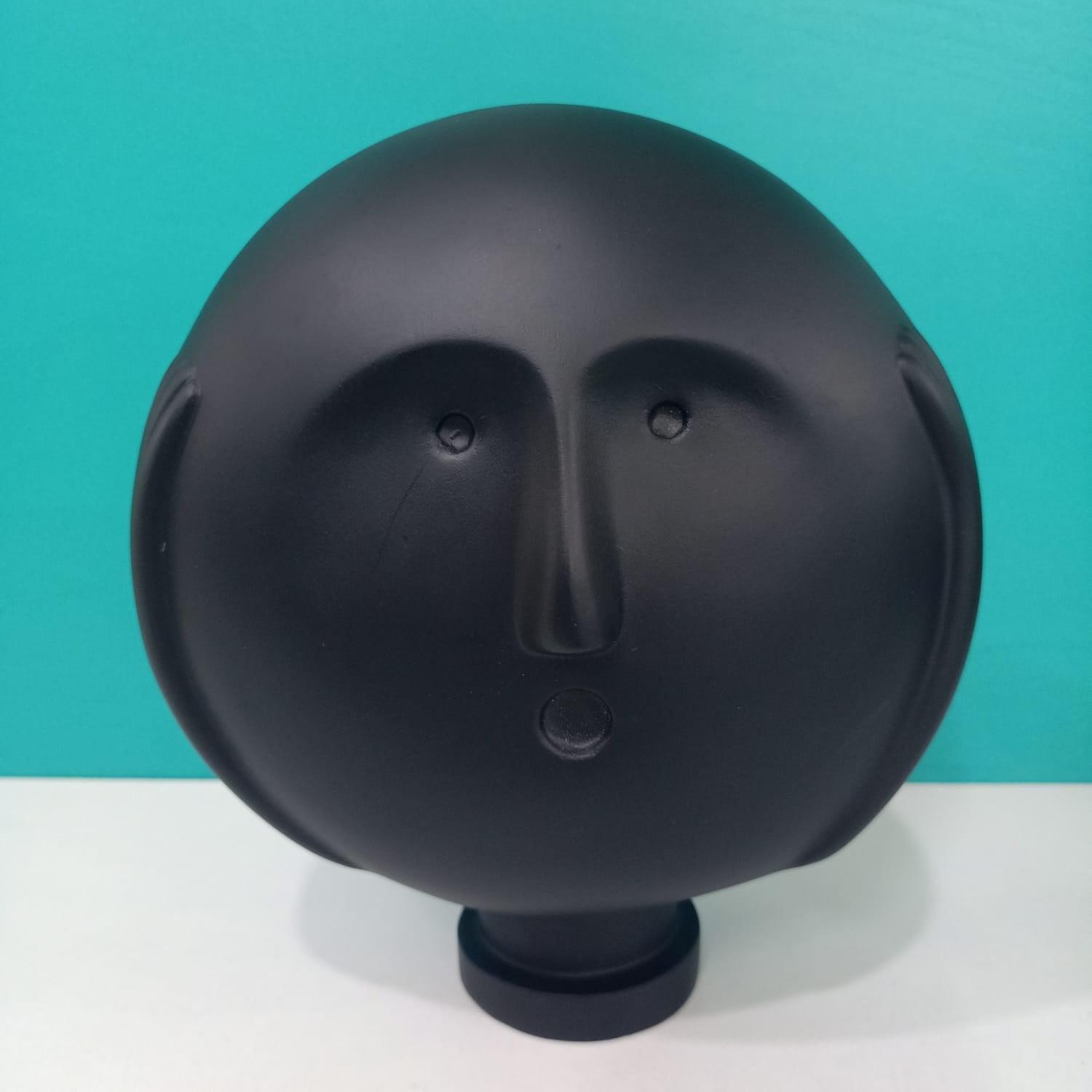 CLEVER CLAY MAN SCULPTURE